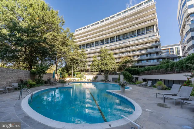 a view of a lake with a building in the background