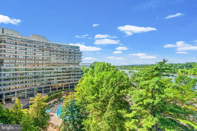 a view of a lake with a yard