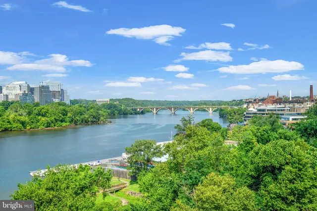 a view of a lake with a city