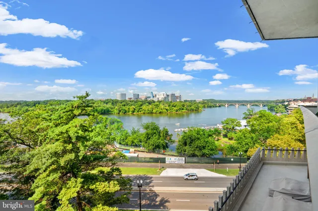 a view of a lake with a yard
