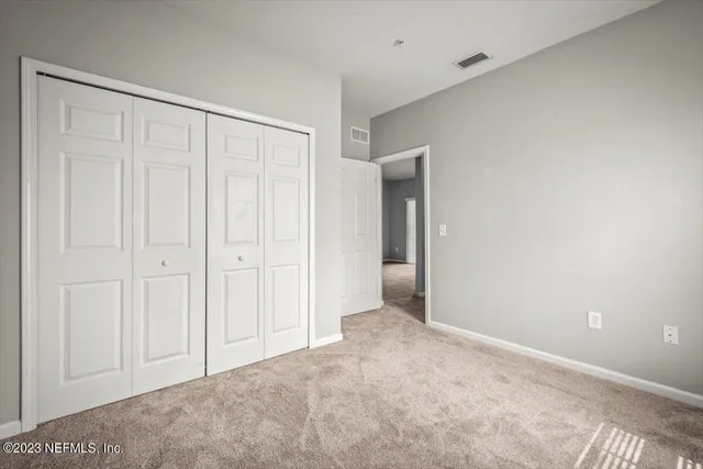 a bathroom with a sink toilet and a mirror