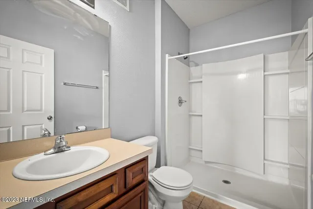 a view of a building with a garden