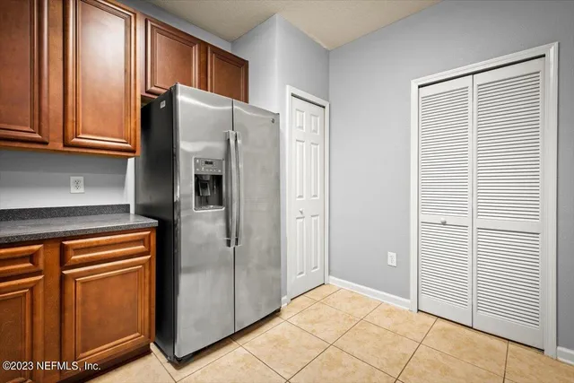 a view of a hallway with washer and dryer