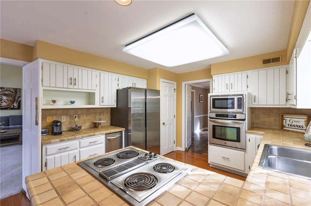 228 Sweet Gum Road Pittsburgh, PA 15238 - Photo 11 of 43 Plenty of cabinetry and a pantry