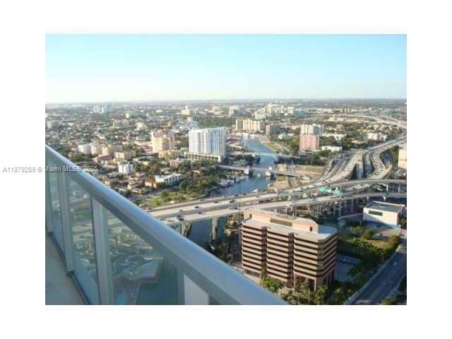 185 Southwest 7th Street, Unit 1909 Miami, FL 33130 - Photo 3 of 6 a view of city from balcony
