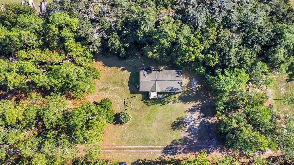 42312 Webster Street Altoona, FL 32702 - Photo 28 of 30 an aerial view of residential house with outdoor space and trees all around