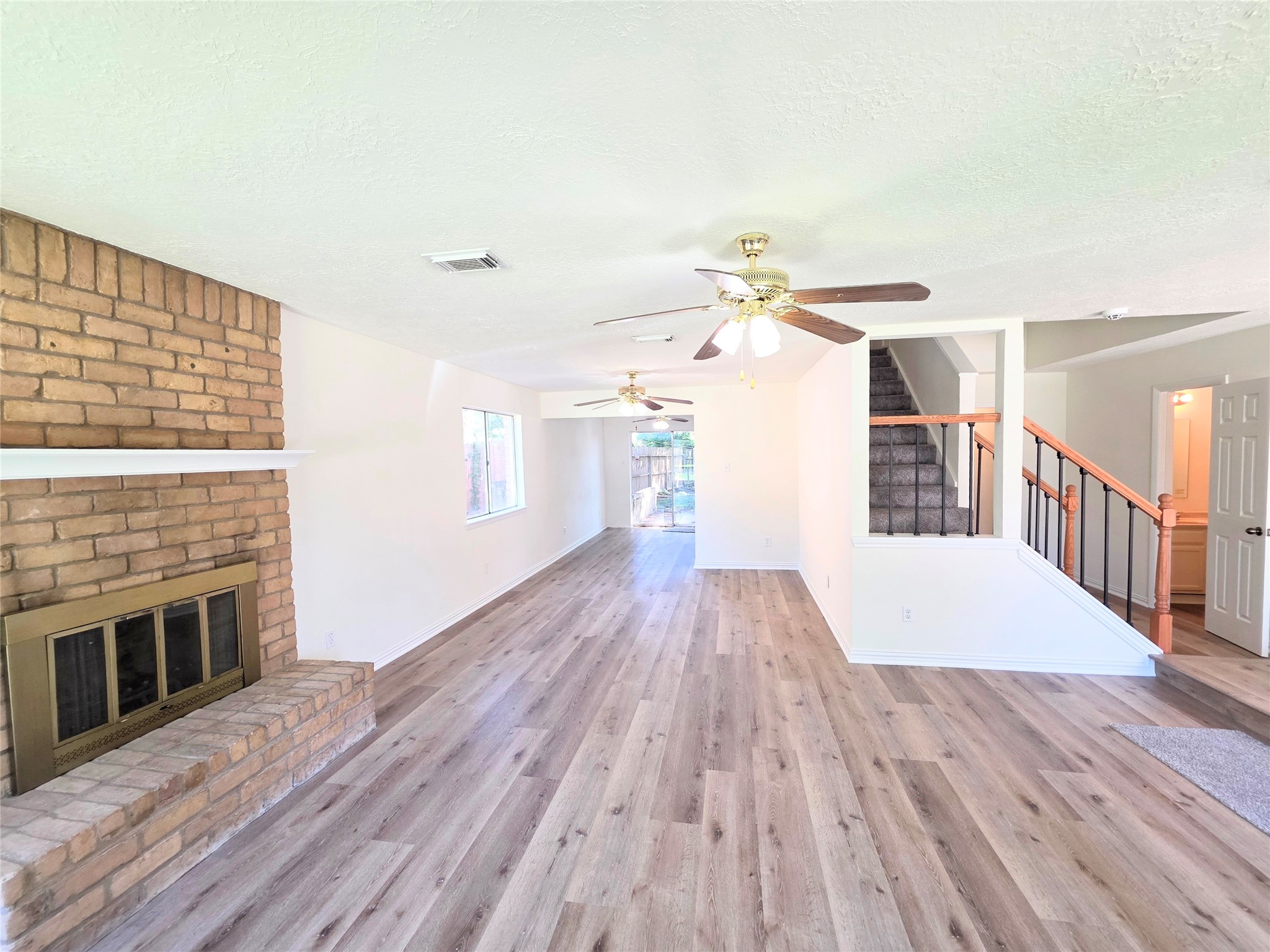24022 Spring Briar Lane Spring, TX 77373 - Photo 5 of 35 Open livingroom to dining and kitchen area