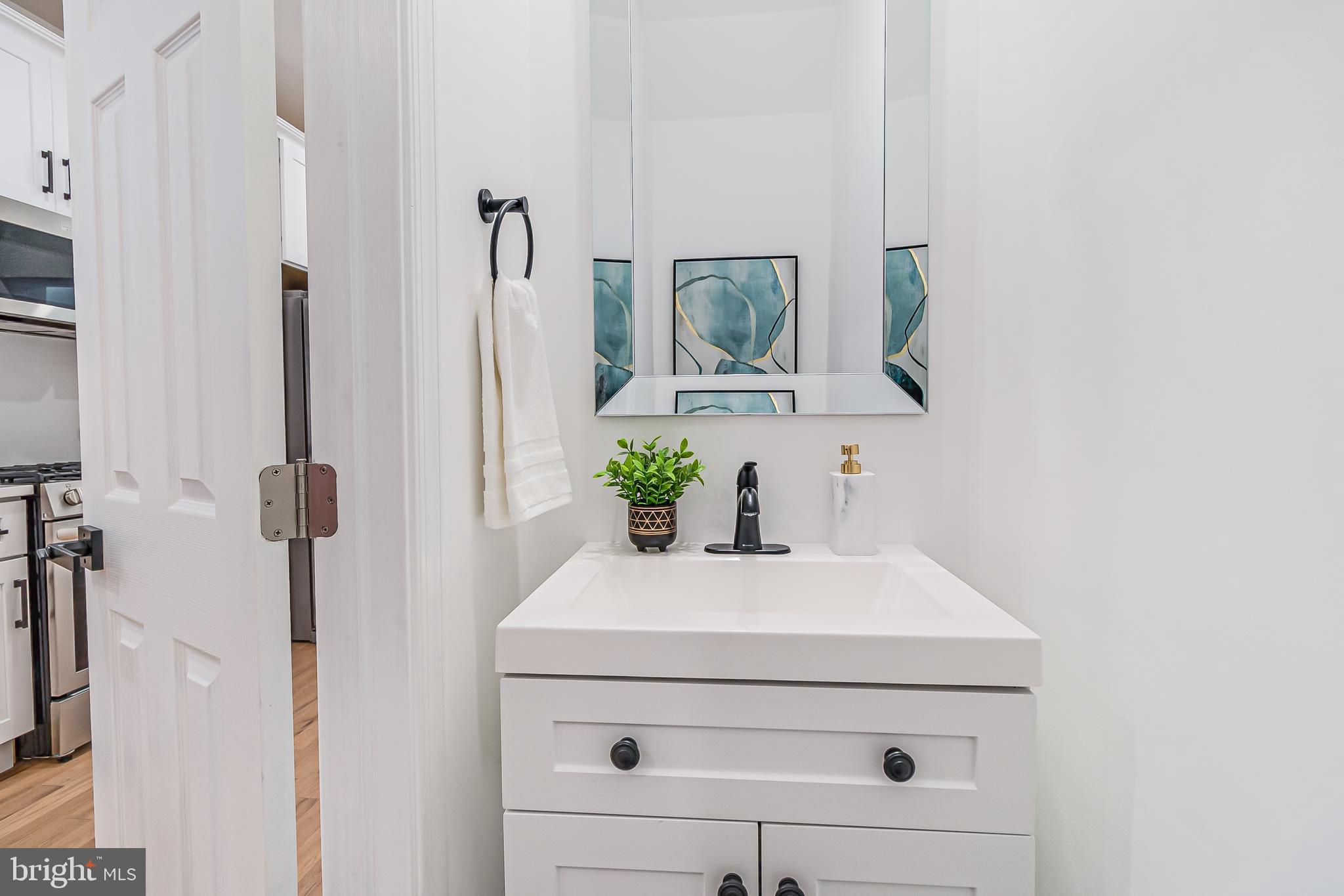 1312 E Street Northeast Washington, DC 20002 - Photo 16 of 28 HALF BATH FIRST FLOOR