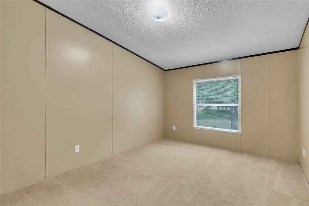1448 Boys Ranch Road Waco, TX 76705 - Photo 16 of 31 an empty room with a window