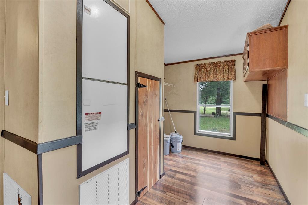 1448 Boys Ranch Road Waco, TX 76705 - Photo 19 of 31 a view of hallway with furniture and a window