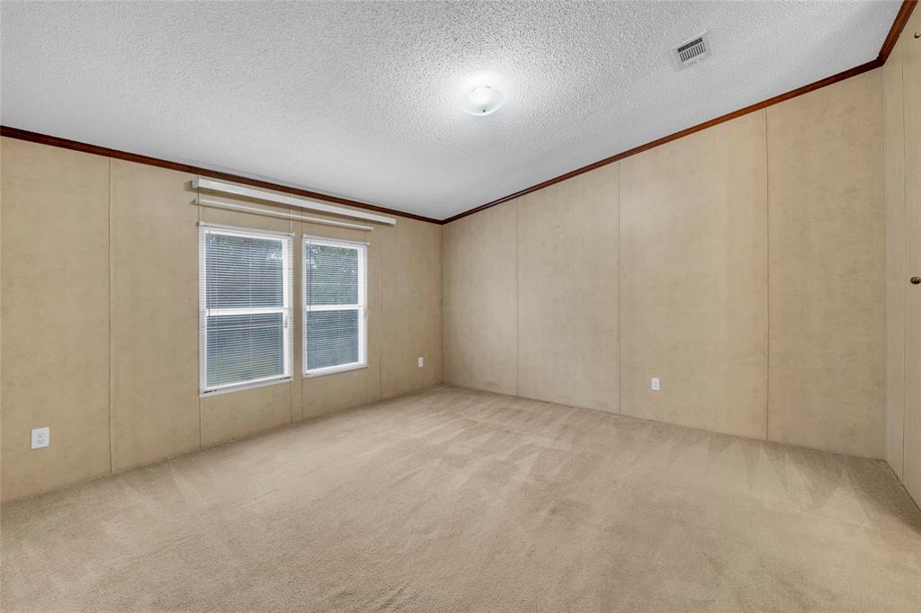 1448 Boys Ranch Road Waco, TX 76705 - Photo 7 of 31 a view of an empty room with a window