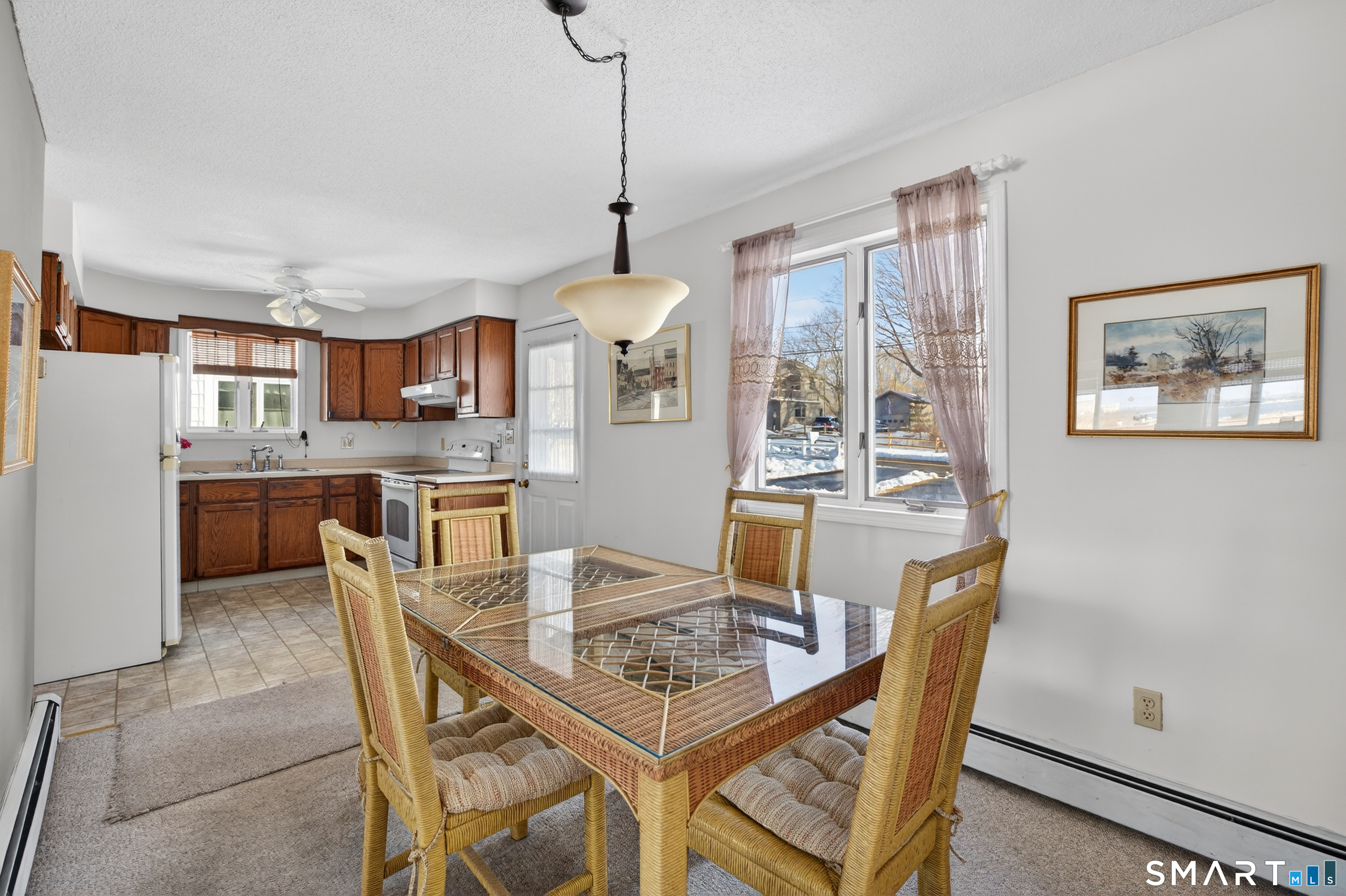 60 New Shore Road Waterford, CT 06385 - Photo 14 of 33 Dining room to kitchen