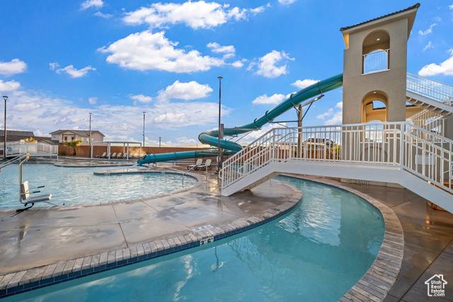 1329 Paseos Street Washington, UT 84780 - Photo 35 of 35 Community pool featuring a patio area and a water slide