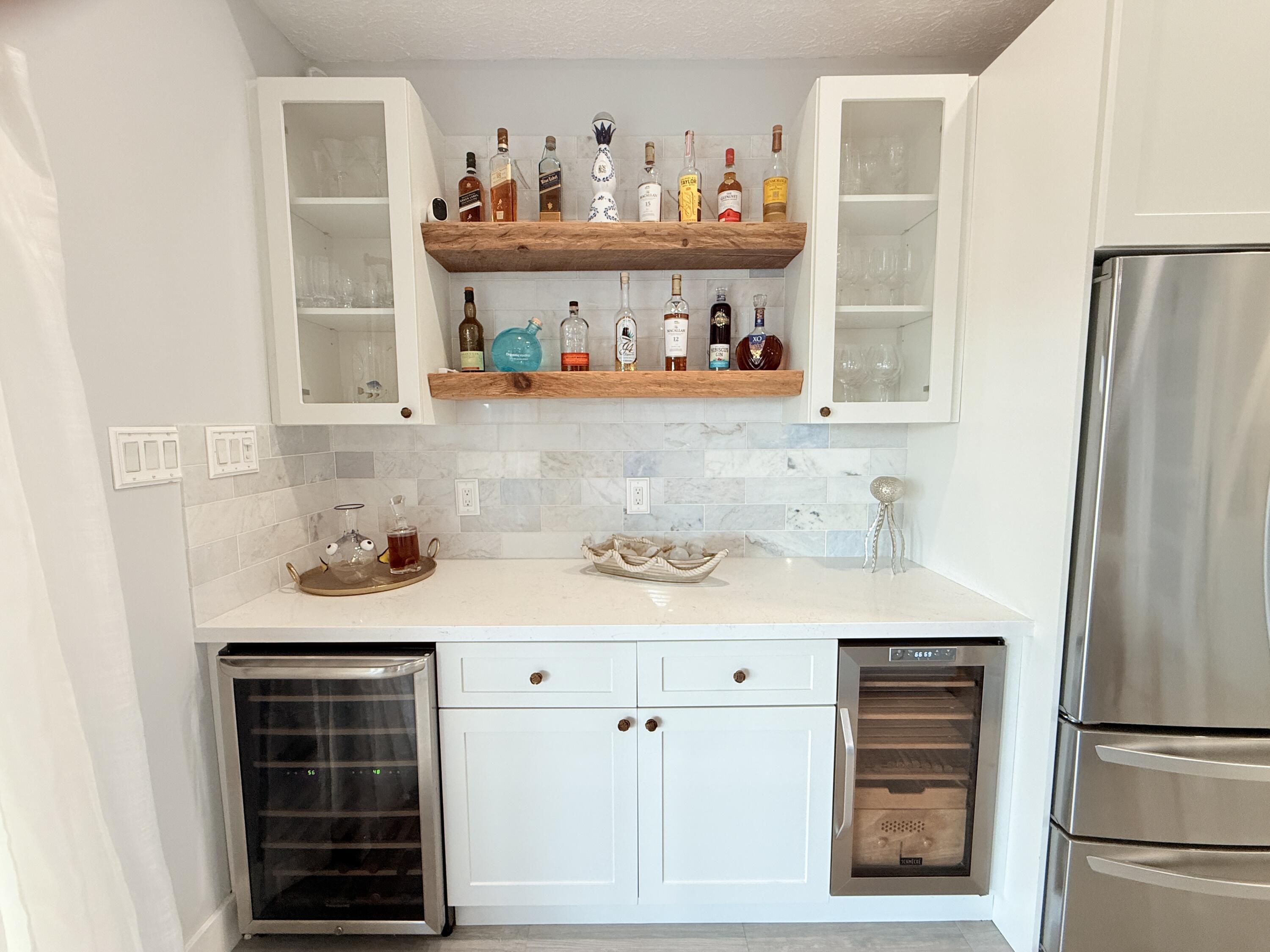 614 R Santa Anita Lane Key Largo, FL 33037 - Photo 21 of 64 a kitchen with white cabinets and refrigerator