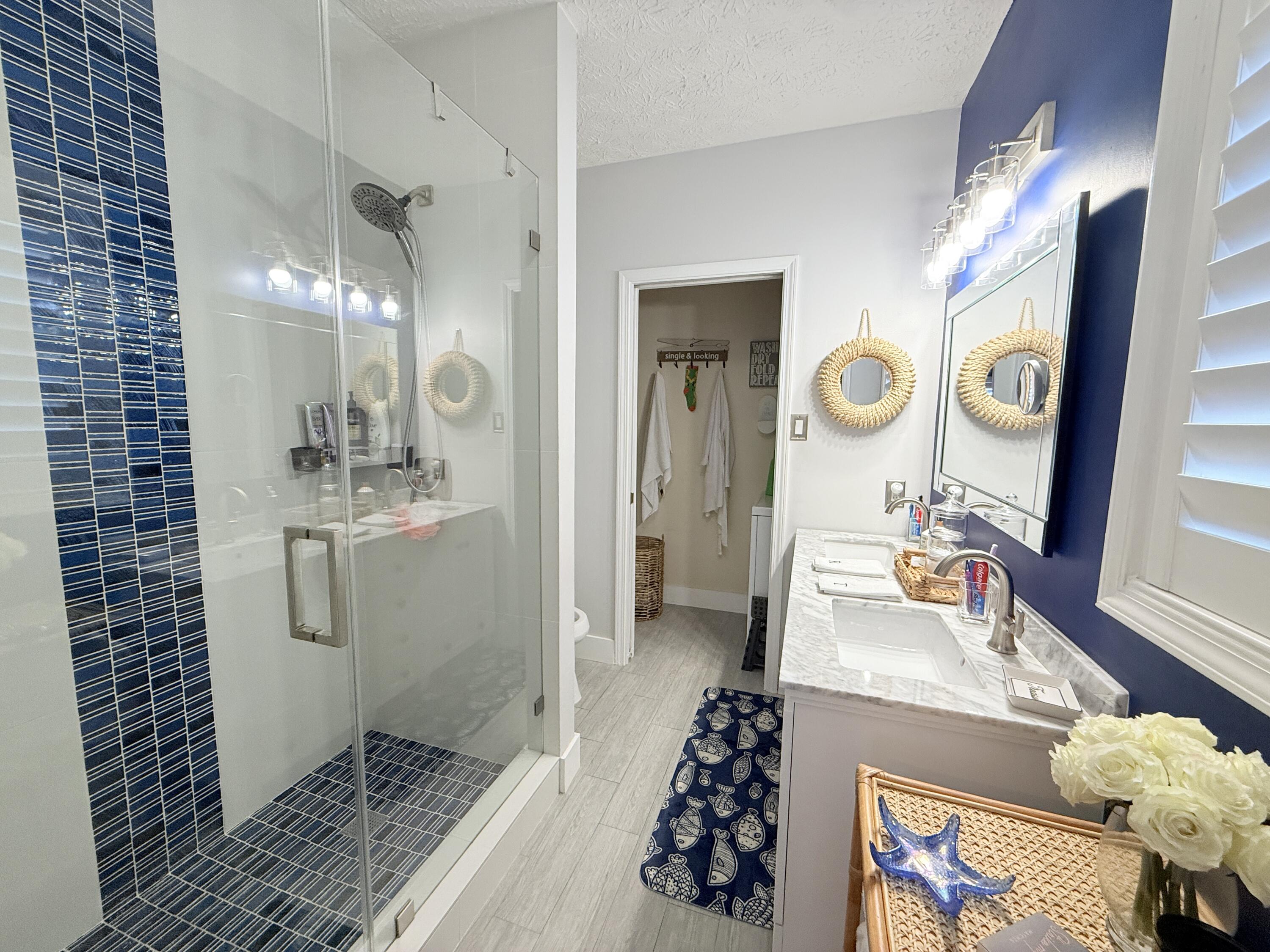 614 R Santa Anita Lane Key Largo, FL 33037 - Photo 25 of 64 a bathroom with a sink toilet and shower