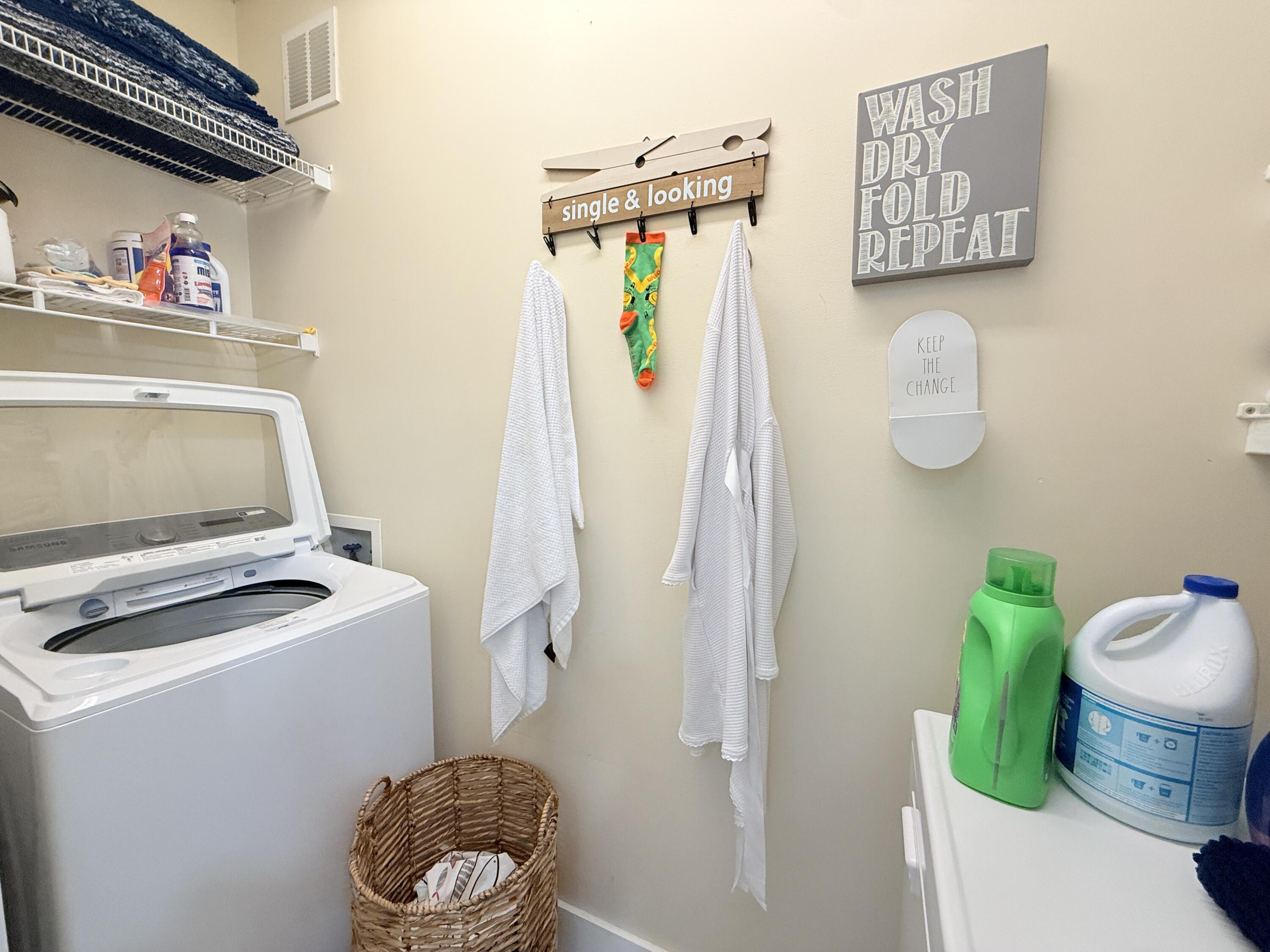 614 R Santa Anita Lane Key Largo, FL 33037 - Photo 28 of 64 a utility room with dryer and washer