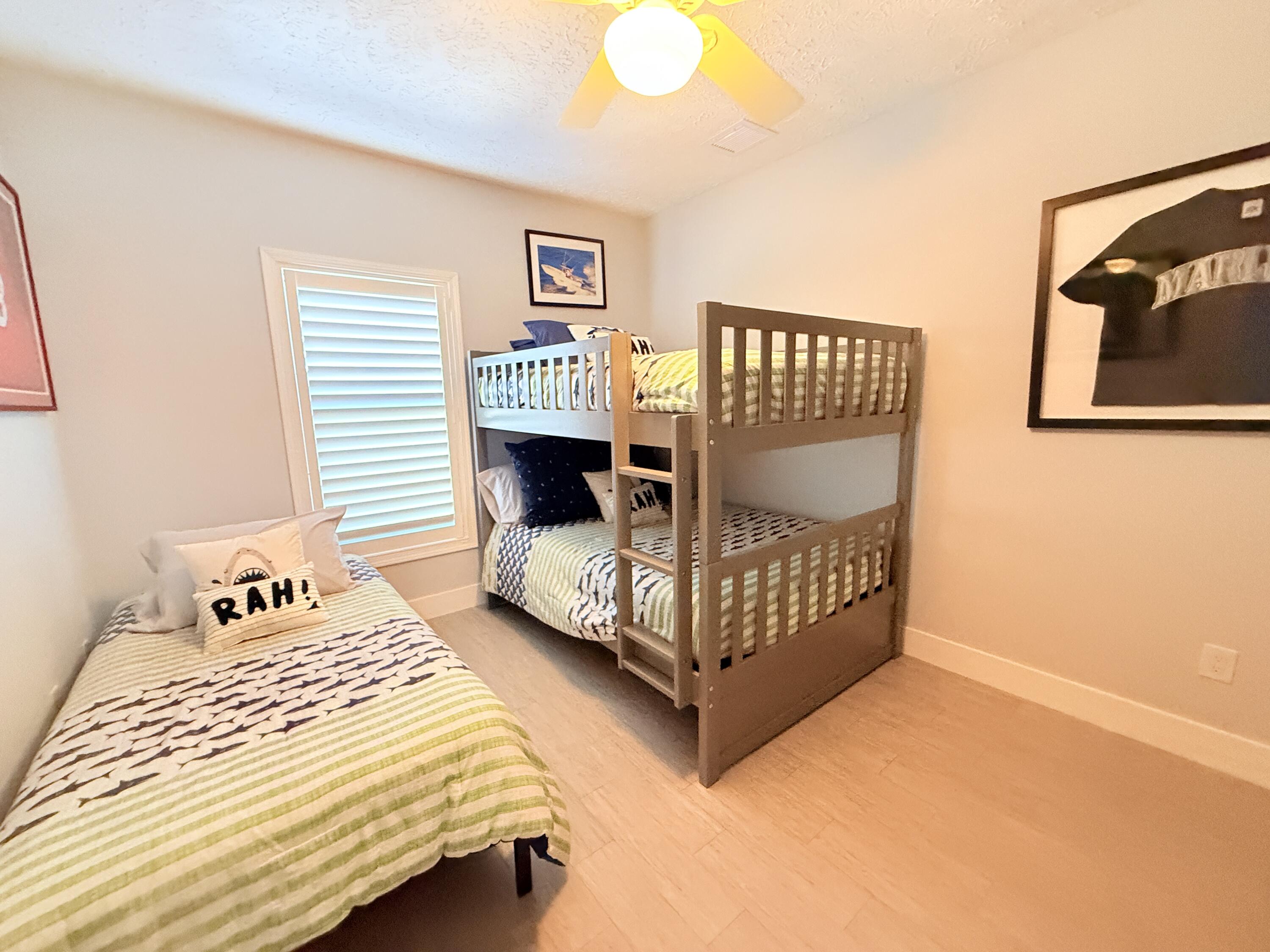 614 R Santa Anita Lane Key Largo, FL 33037 - Photo 30 of 64 a bedroom with a bed and window