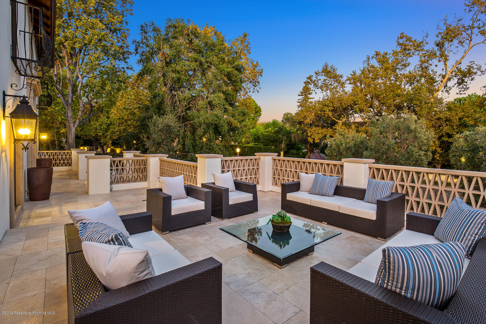 1185 Arden Road Pasadena, CA 91106 - Photo 3 of 52 a view of a patio with couches and a large tree