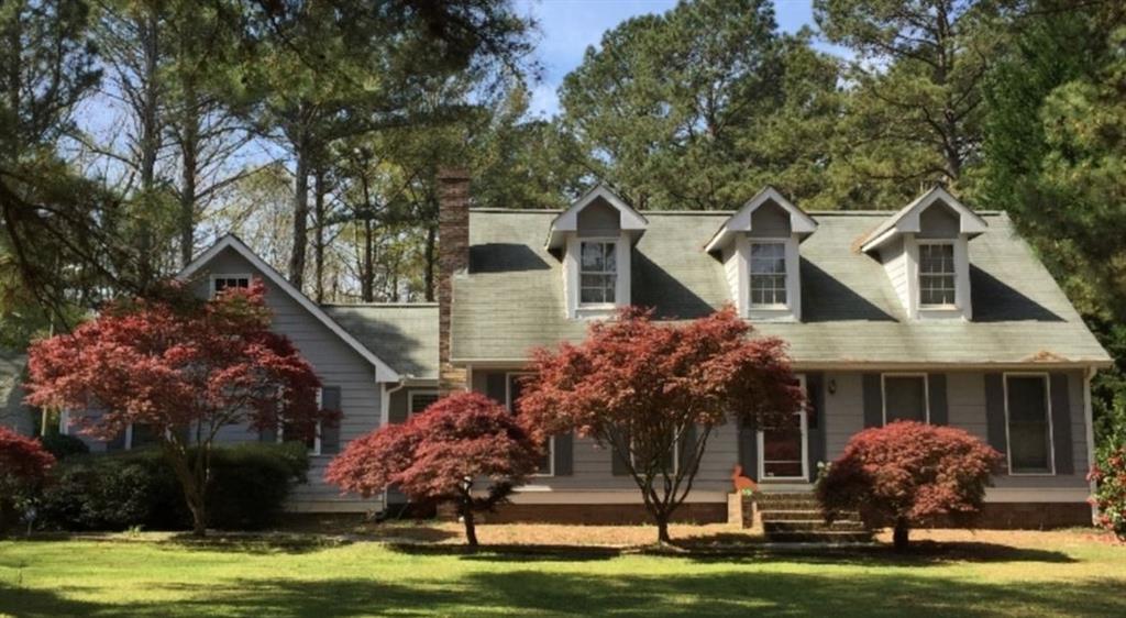 175 Deep Step Road Covington, GA 30014 - Photo 1 of 1 a front view of house with yard