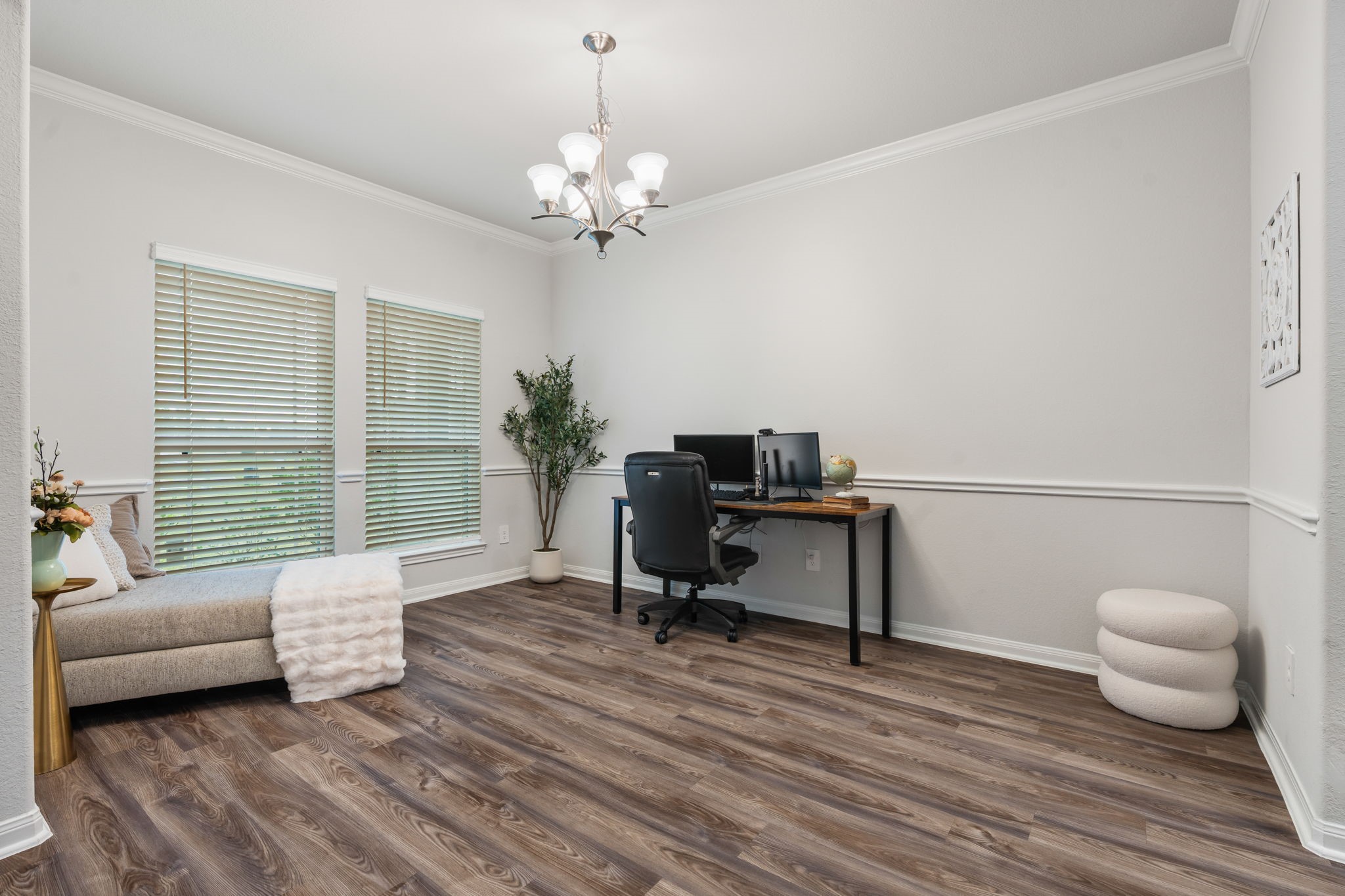16680 Rockwall Street Conroe, TX 77303 - Photo 5 of 38 Currently used as an office this front room could also be a formal dining room.