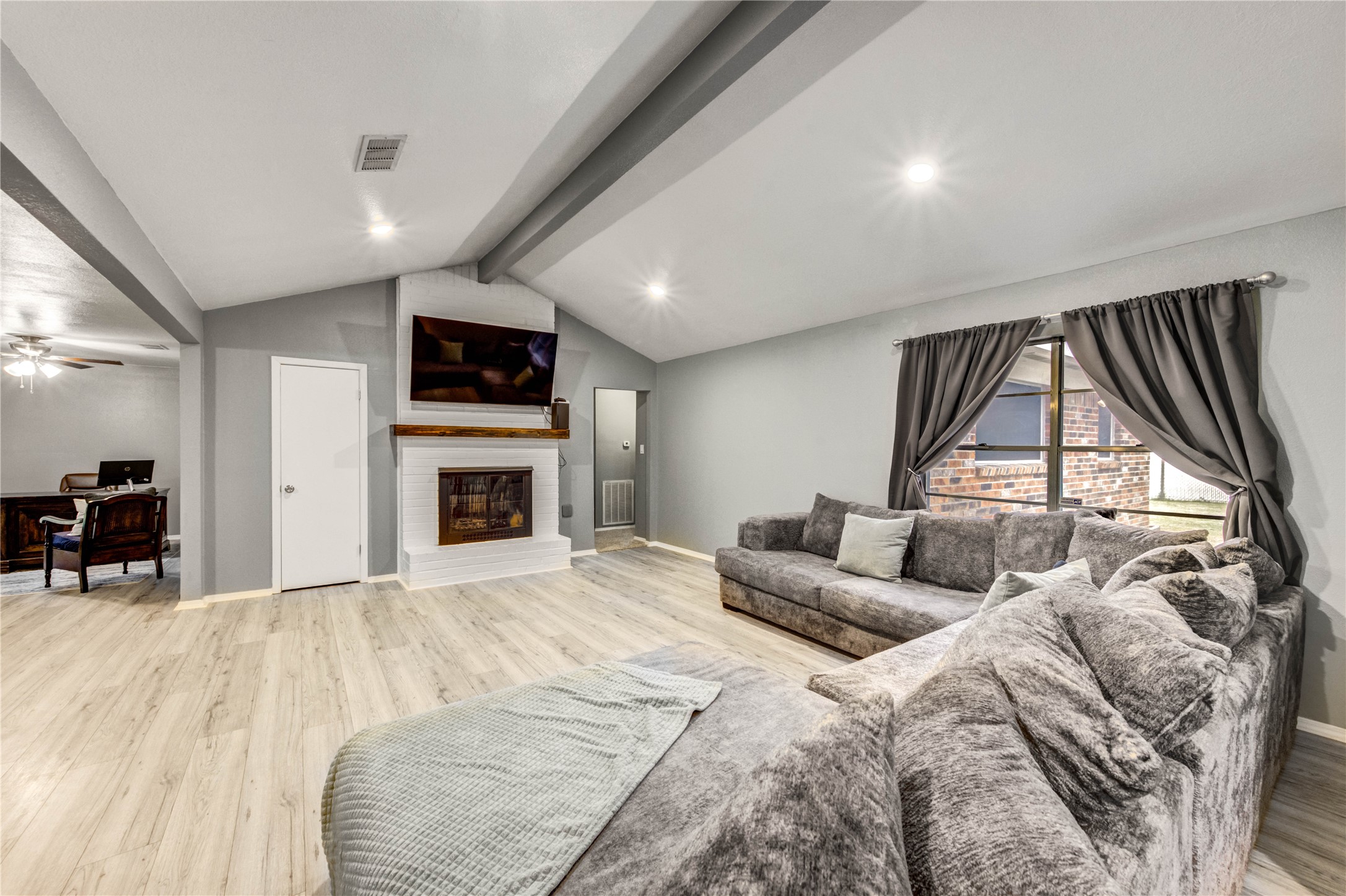 8510 Collingdale Road La Porte, TX 77571 - Photo 3 of 20 a spacious bedroom with a large bed and a tv