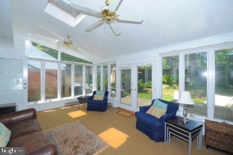 5807 Overlea Road Bethesda, MD 20816 - Photo 12 of 23 a living room with furniture and a large window