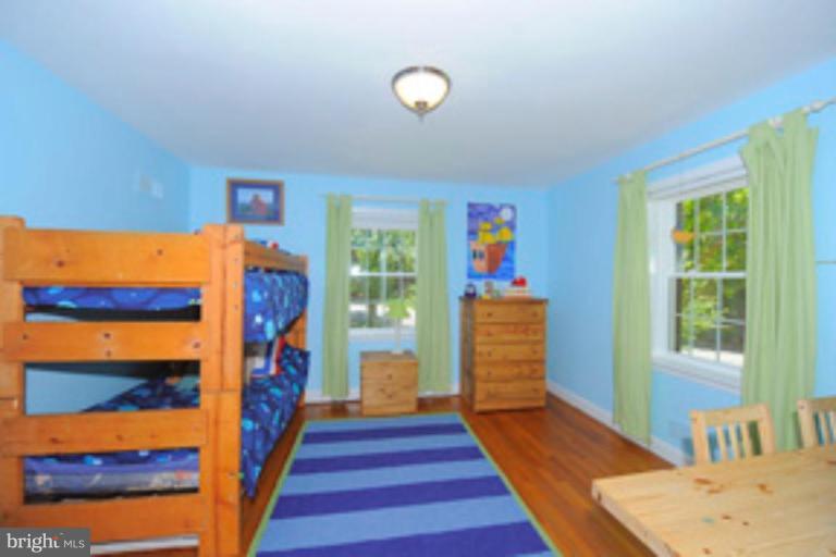 5807 Overlea Road Bethesda, MD 20816 - Photo 14 of 23 a bedroom with a bed and a window