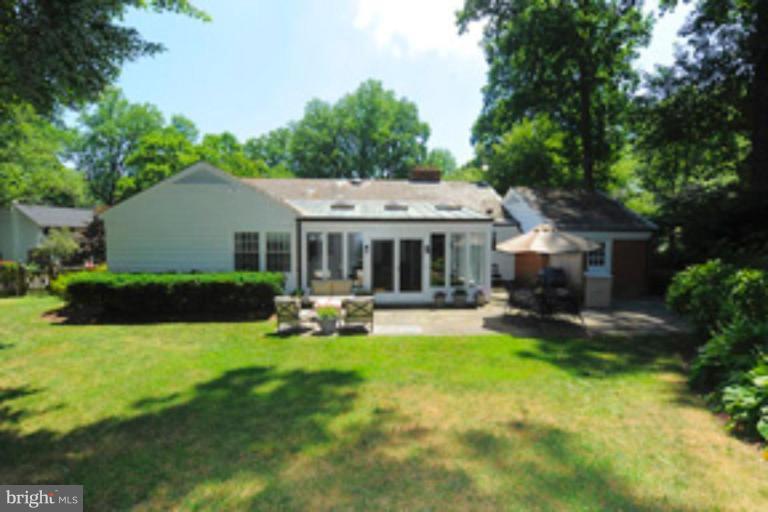 5807 Overlea Road Bethesda, MD 20816 - Photo 22 of 23 a view of a house with a yard patio and a patio