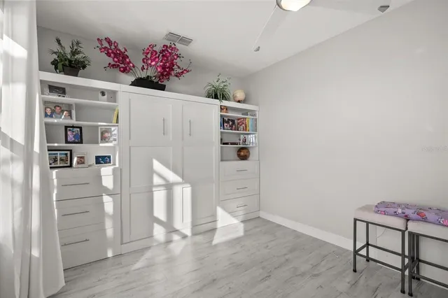 a view of a workspace with furniture