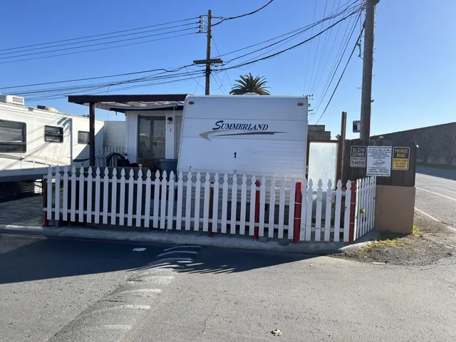 a view of a porch with a fence