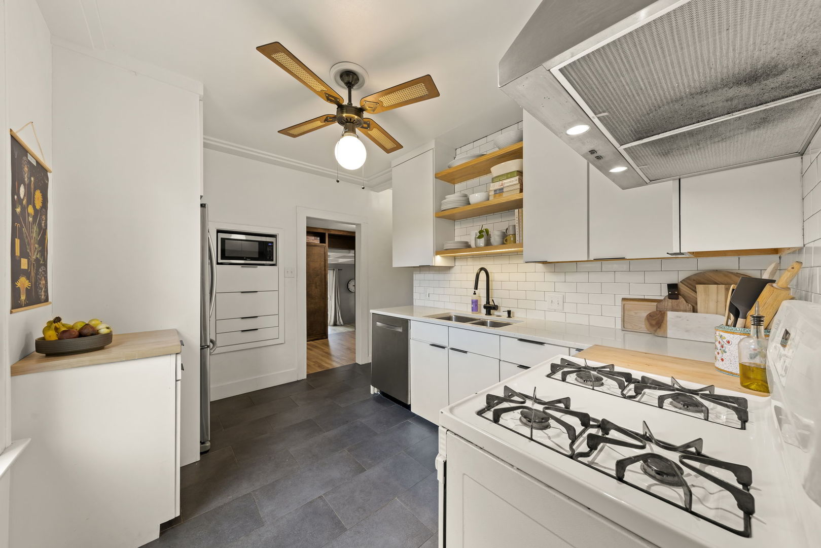 1837 Pine Road Homewood, IL 60430 - Photo 11 of 25 a kitchen with stainless steel appliances granite countertop a stove and a refrigerator