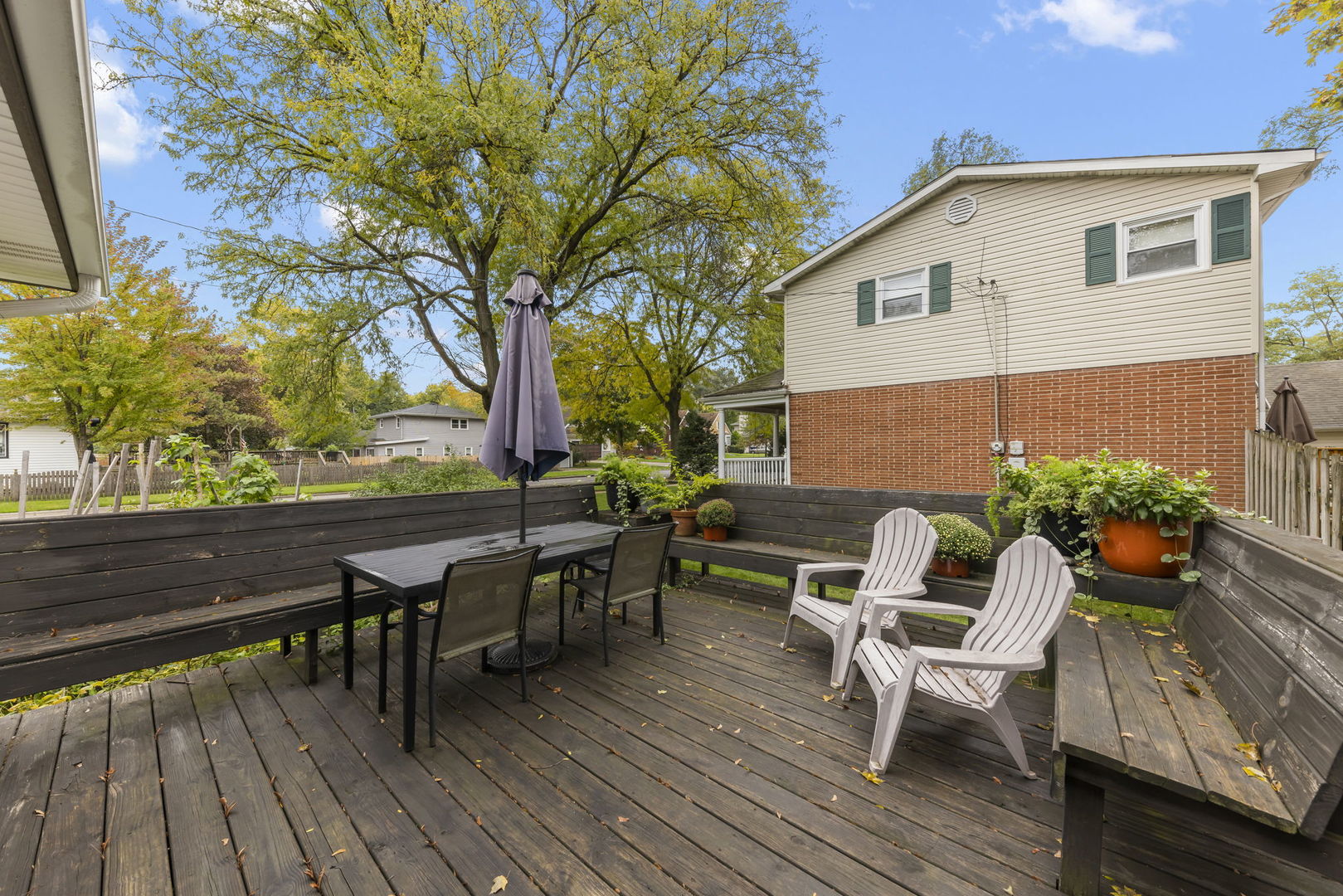 1837 Pine Road Homewood, IL 60430 - Photo 20 of 25 a view of a patio with table and chairs and potted plants