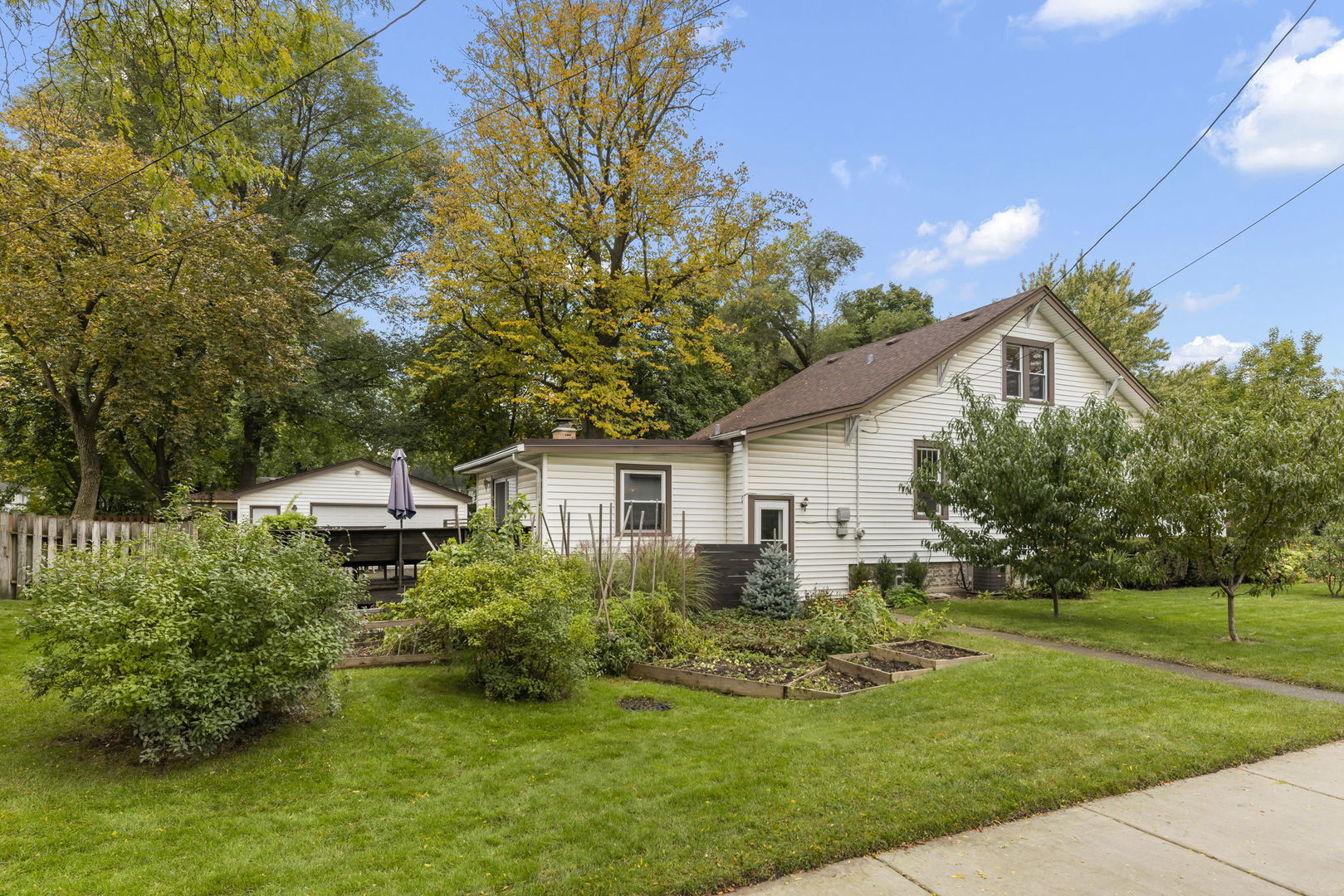 1837 Pine Road Homewood, IL 60430 - Photo 22 of 25 a front view of house with yard and green space