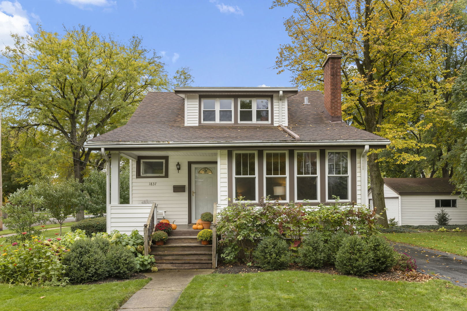 1837 Pine Road Homewood, IL 60430 - Photo 23 of 25 a front view of a house with garden
