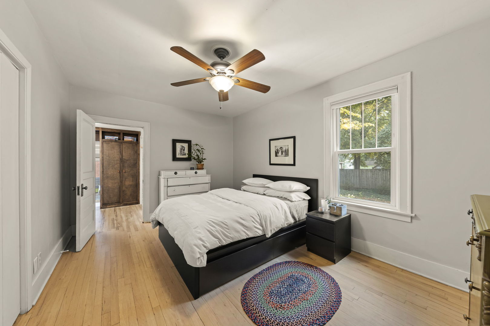 1837 Pine Road Homewood, IL 60430 - Photo 9 of 25 a spacious bedroom with a bed and a window