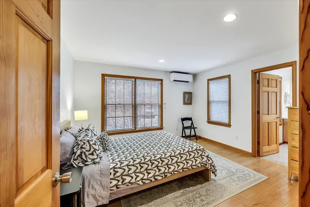 a dining room with furniture window wooden floor