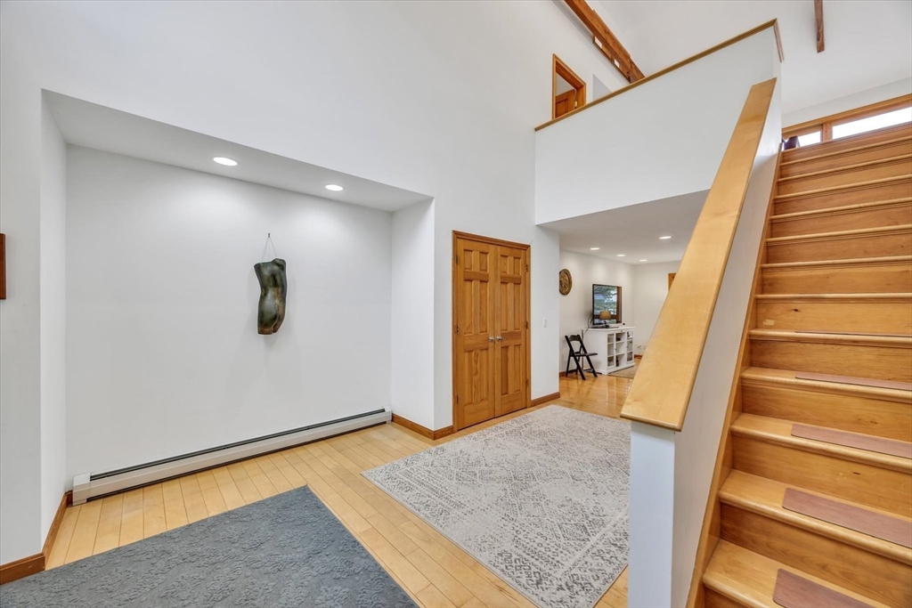 128 Shore Road Truro, MA 02666 - Photo 21 of 42 a view of an entryway with staircase