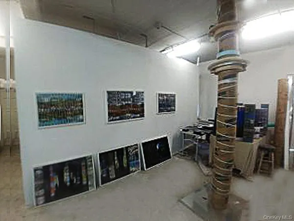 a view of a livingroom with furniture
