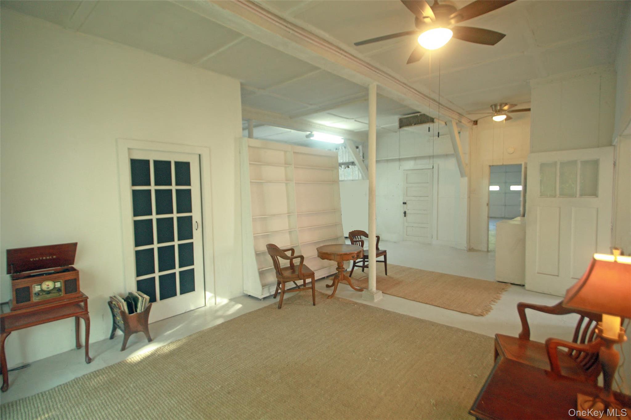 876 North Branch Road North Branch, NY 12766 - Photo 4 of 27 a living room with furniture a window and a chandelier