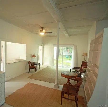 a workspace with furniture and a window