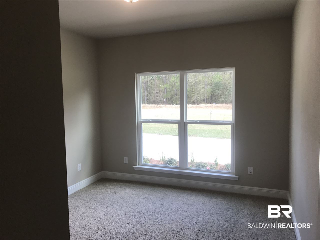 1406 Hickory Street South, Unit 5 Foley, AL 36535 - Photo 13 of 18 Bedroom 2