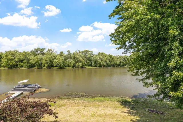 a view of a lake from a yard