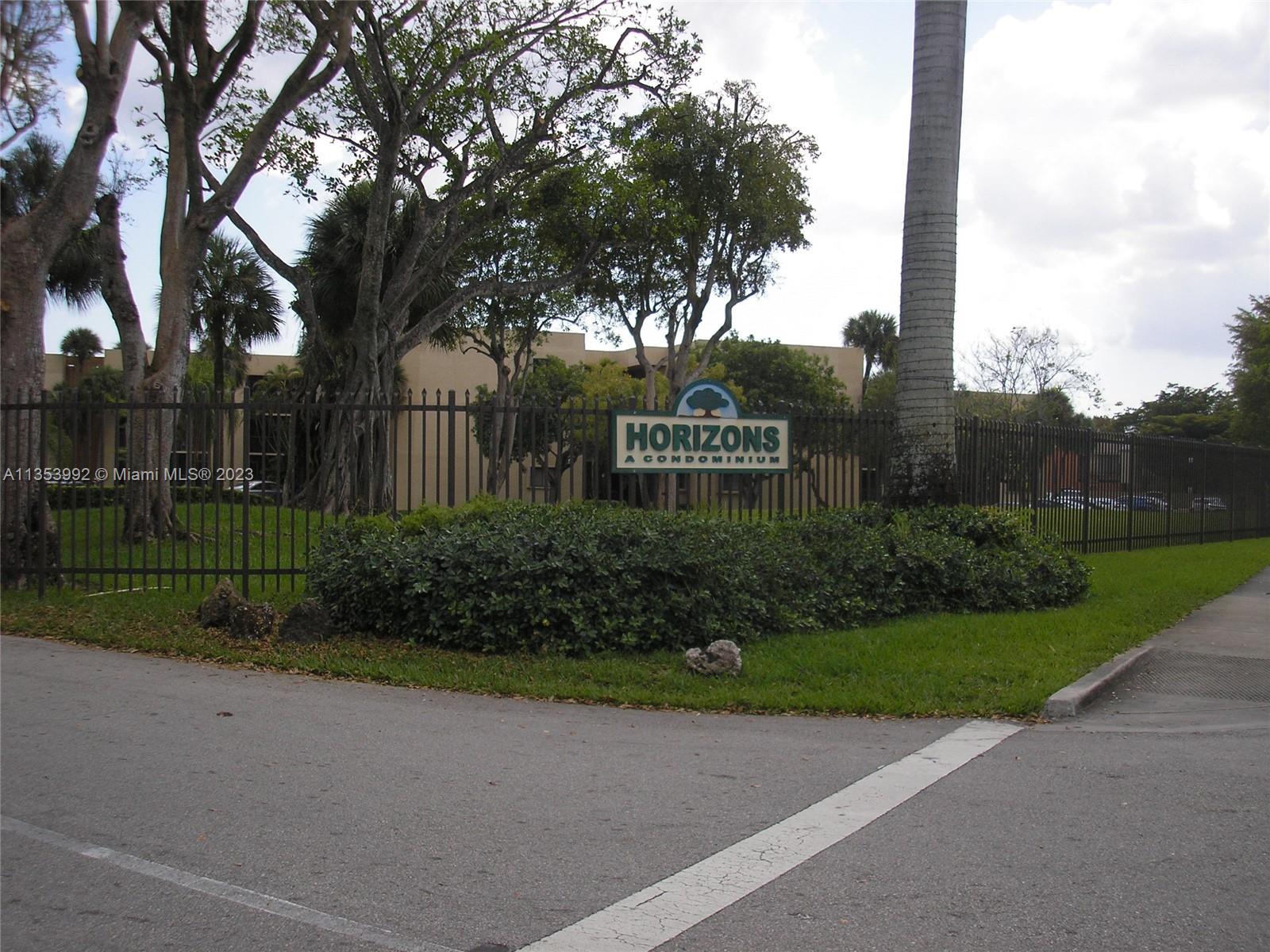 a sign on the side of a road