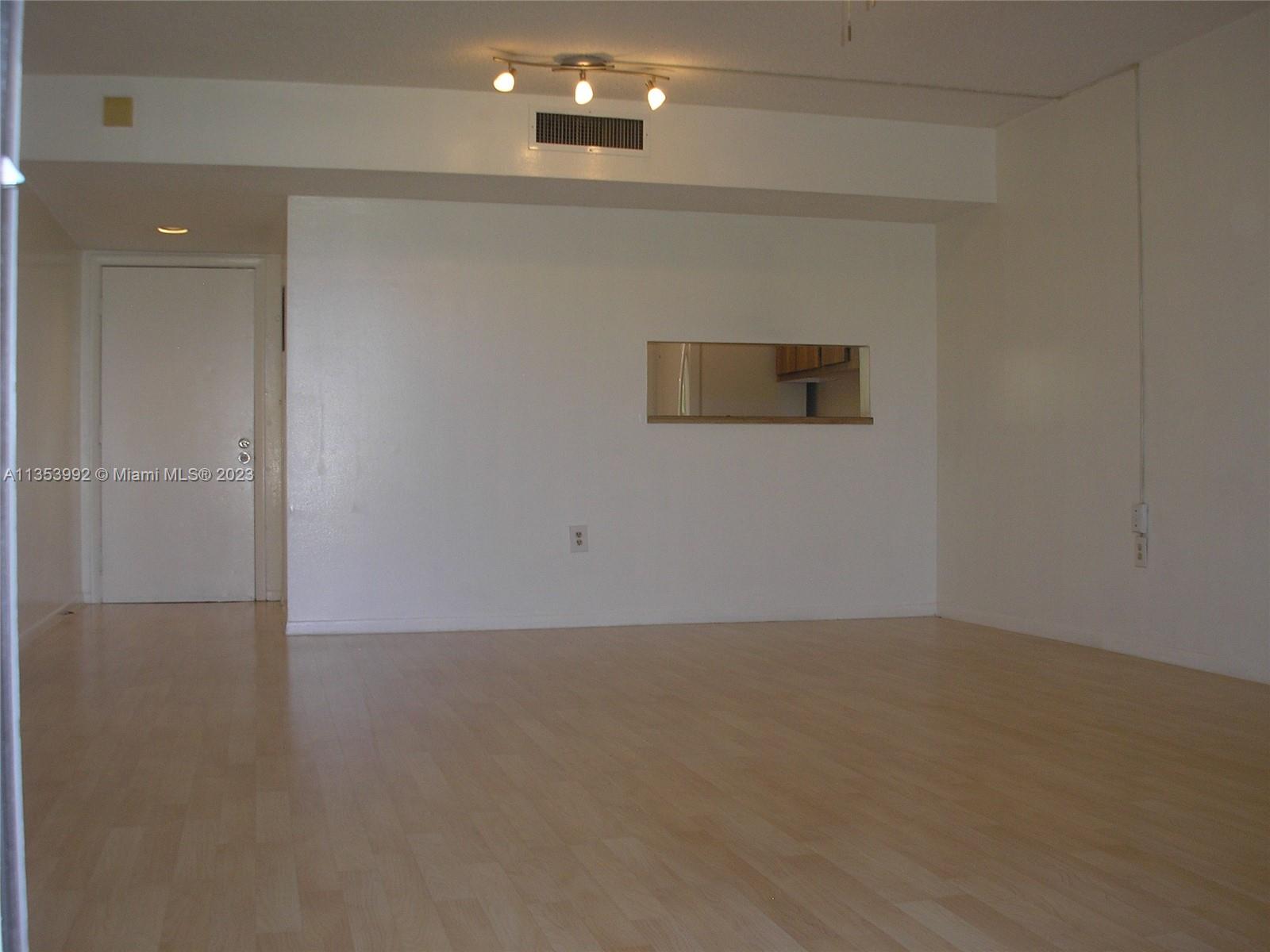 8035 Southwest 107th Avenue, Unit 317 Miami, FL 33173 - Photo 4 of 17 a view of an empty room