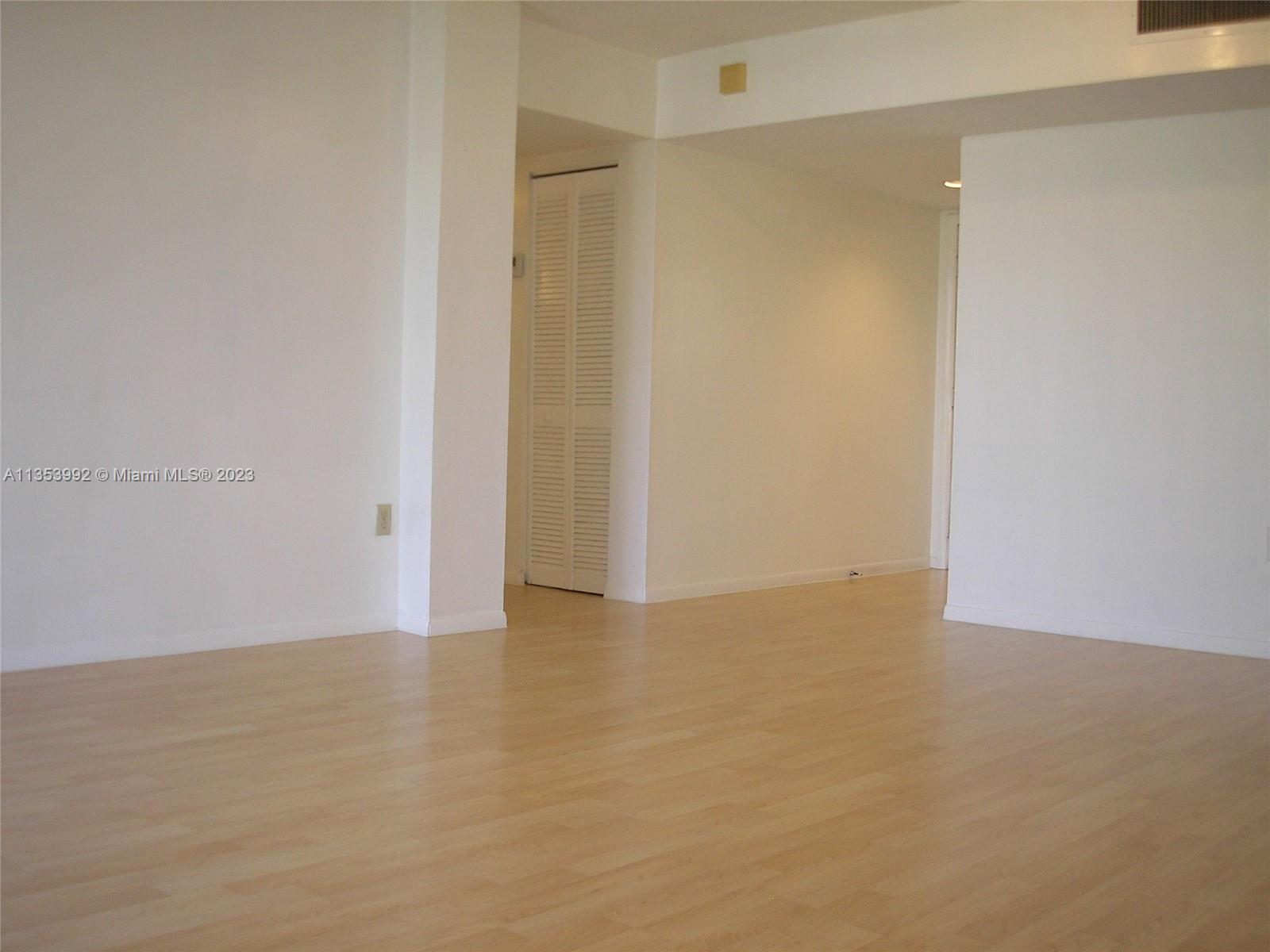 8035 Southwest 107th Avenue, Unit 317 Miami, FL 33173 - Photo 5 of 17 a view of an empty room