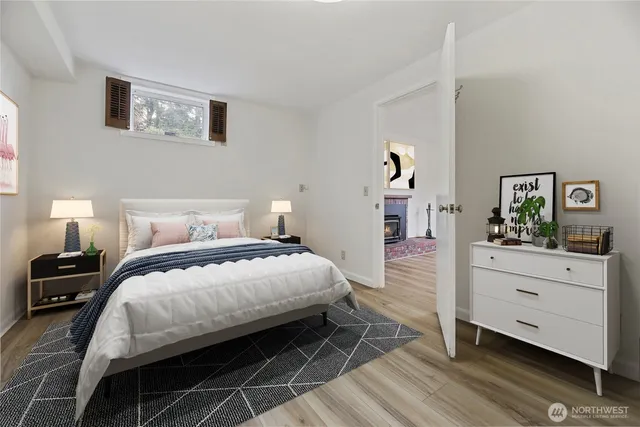 a bedroom with a bed and a cabinets