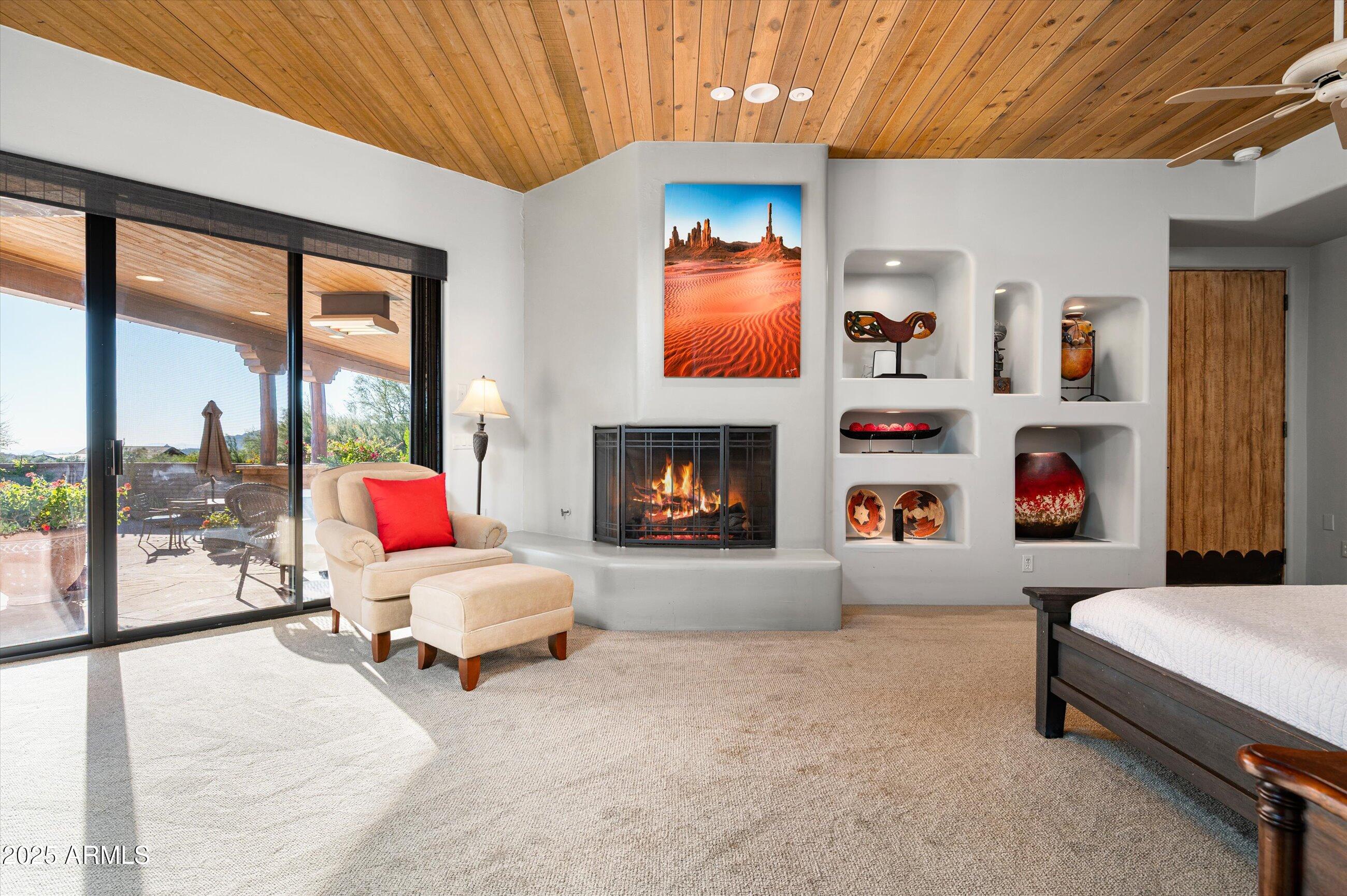 9301 East Bajada Road Scottsdale, AZ 85262 - Photo 20 of 39 Primary Suite Fireplace