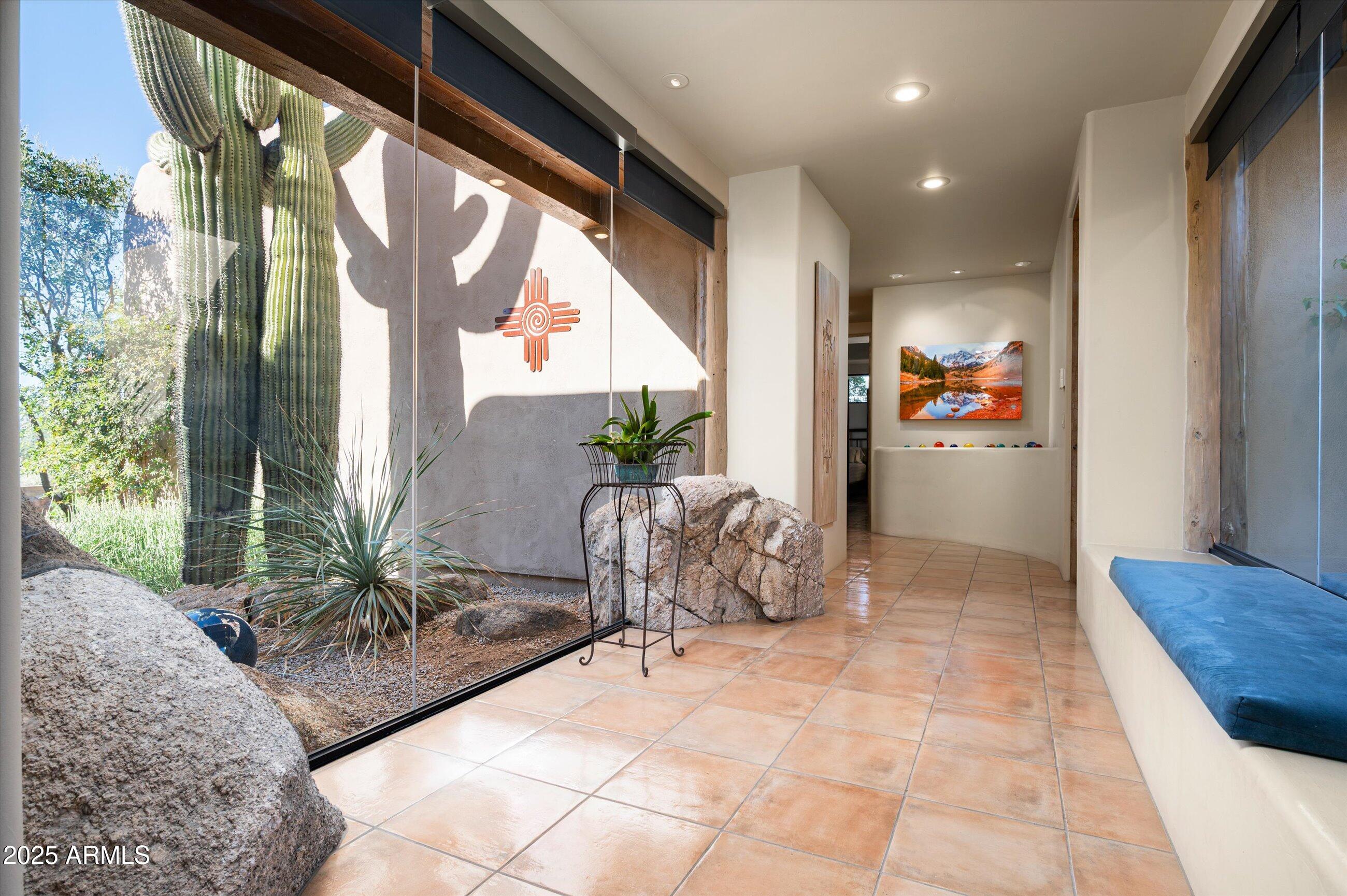 9301 East Bajada Road Scottsdale, AZ 85262 - Photo 27 of 39 Atruim Walkway to Guest Suites
