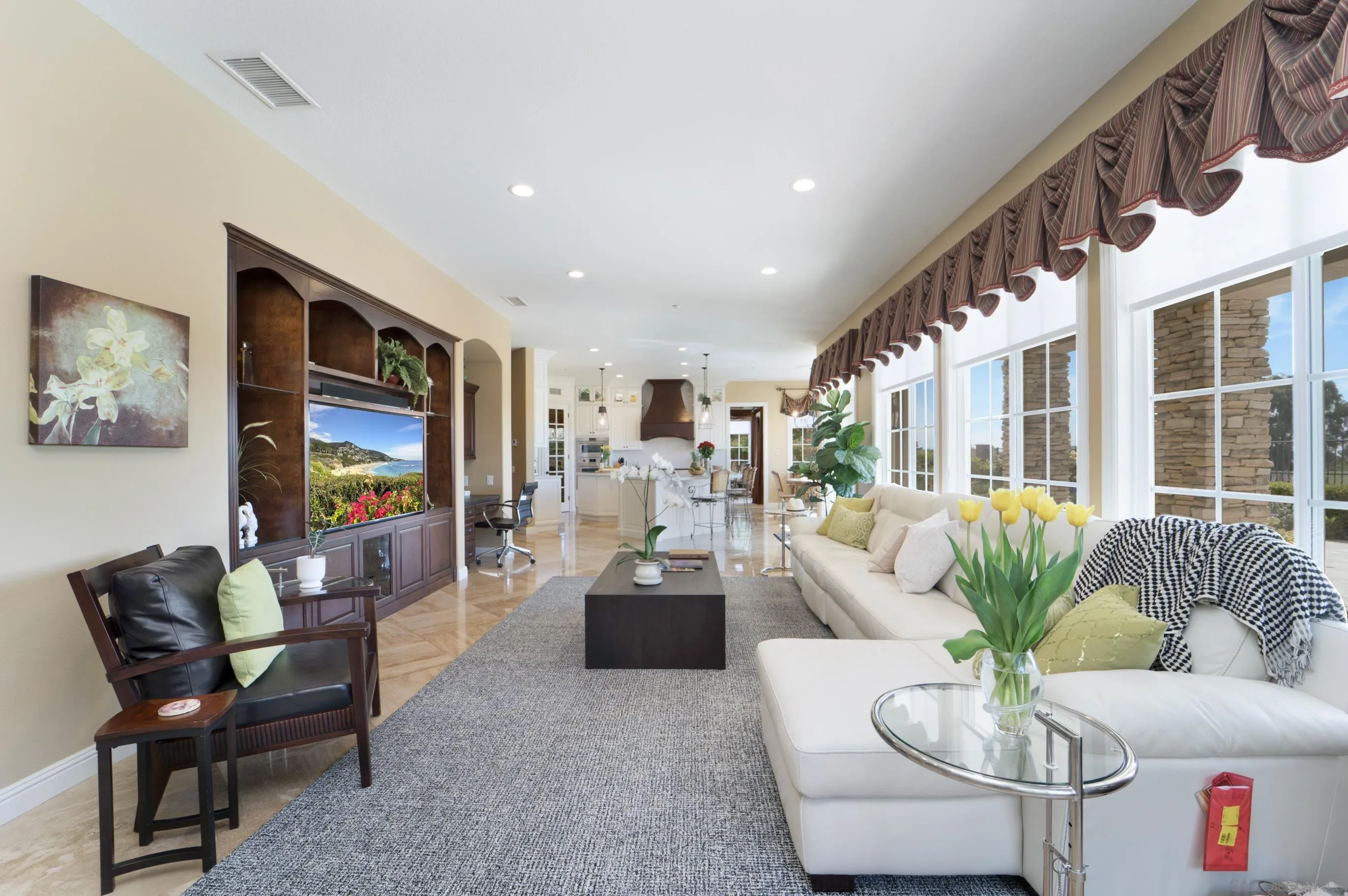 698 Cypress Hills Drive Encinitas, CA 92024 - Photo 14 of 67 a living room with furniture and a flat screen tv