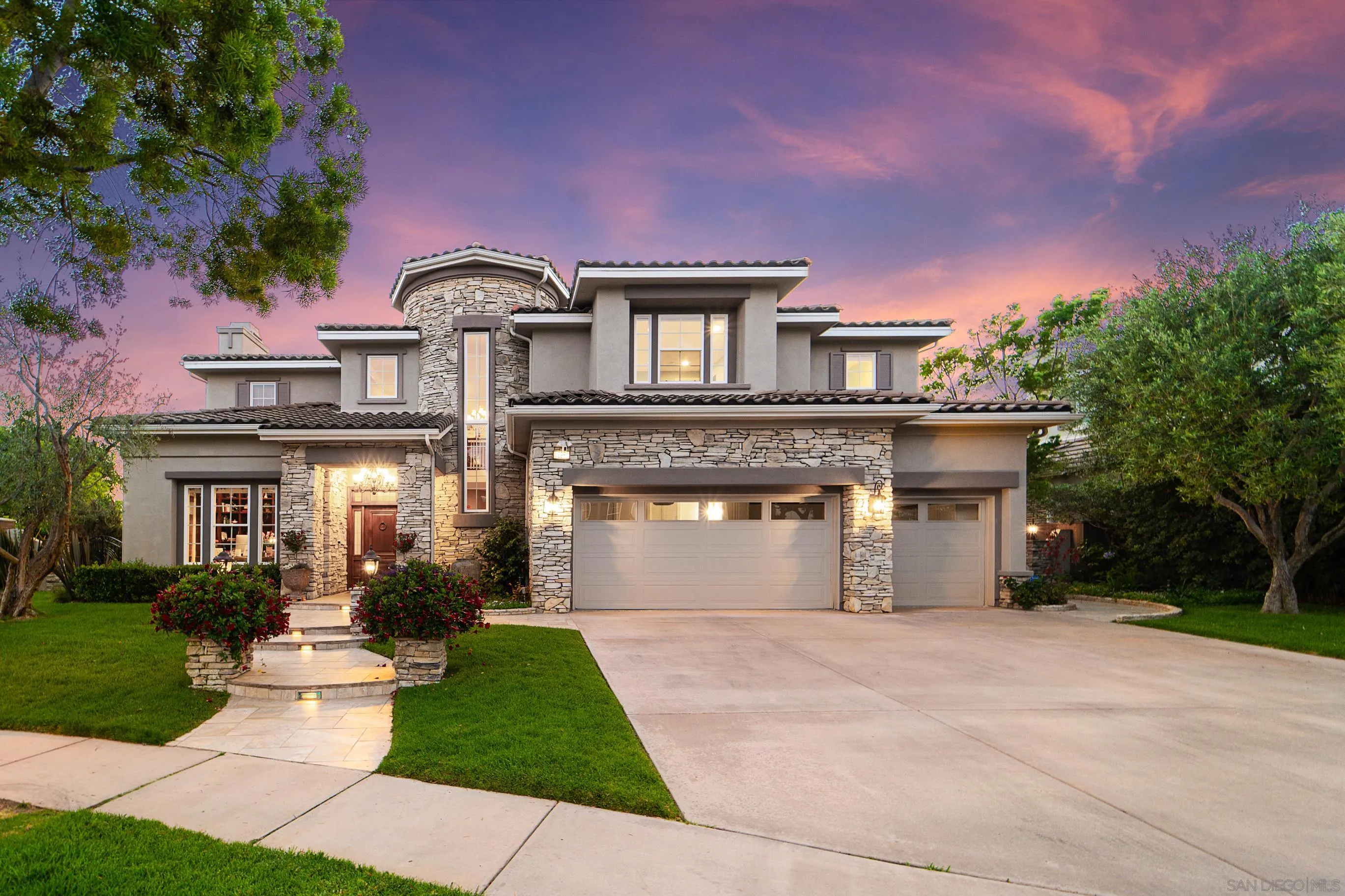 698 Cypress Hills Drive Encinitas, CA 92024 - Photo 2 of 67 a front view of a house with a yard and trees